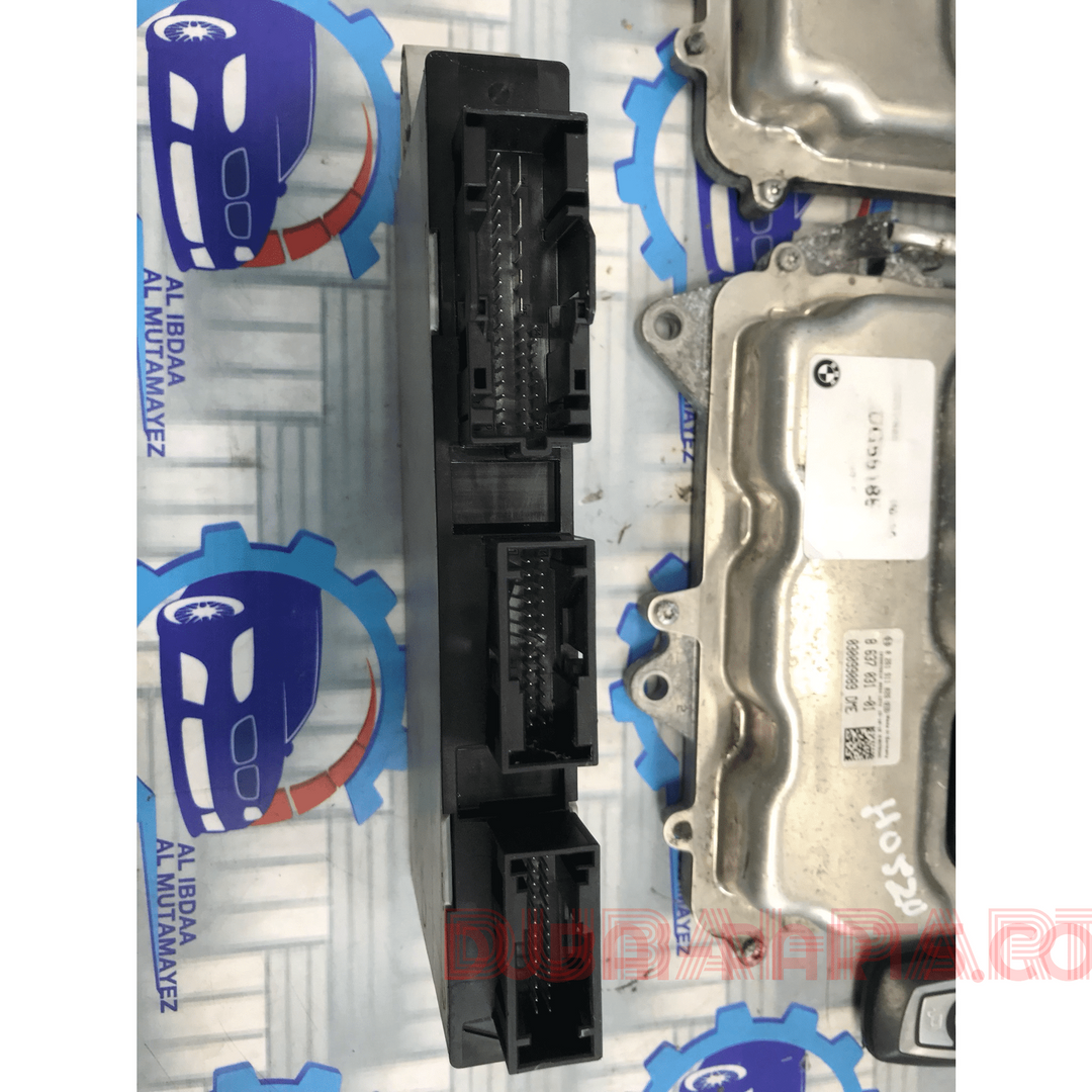 مجموعة وحدة التحكم الإلكترونية (ECU) لسيارة BMW 750i موديل 2015، محرك N63 F02، رقم القطعة 8637031 7649828، منتج أصلي مستعمل