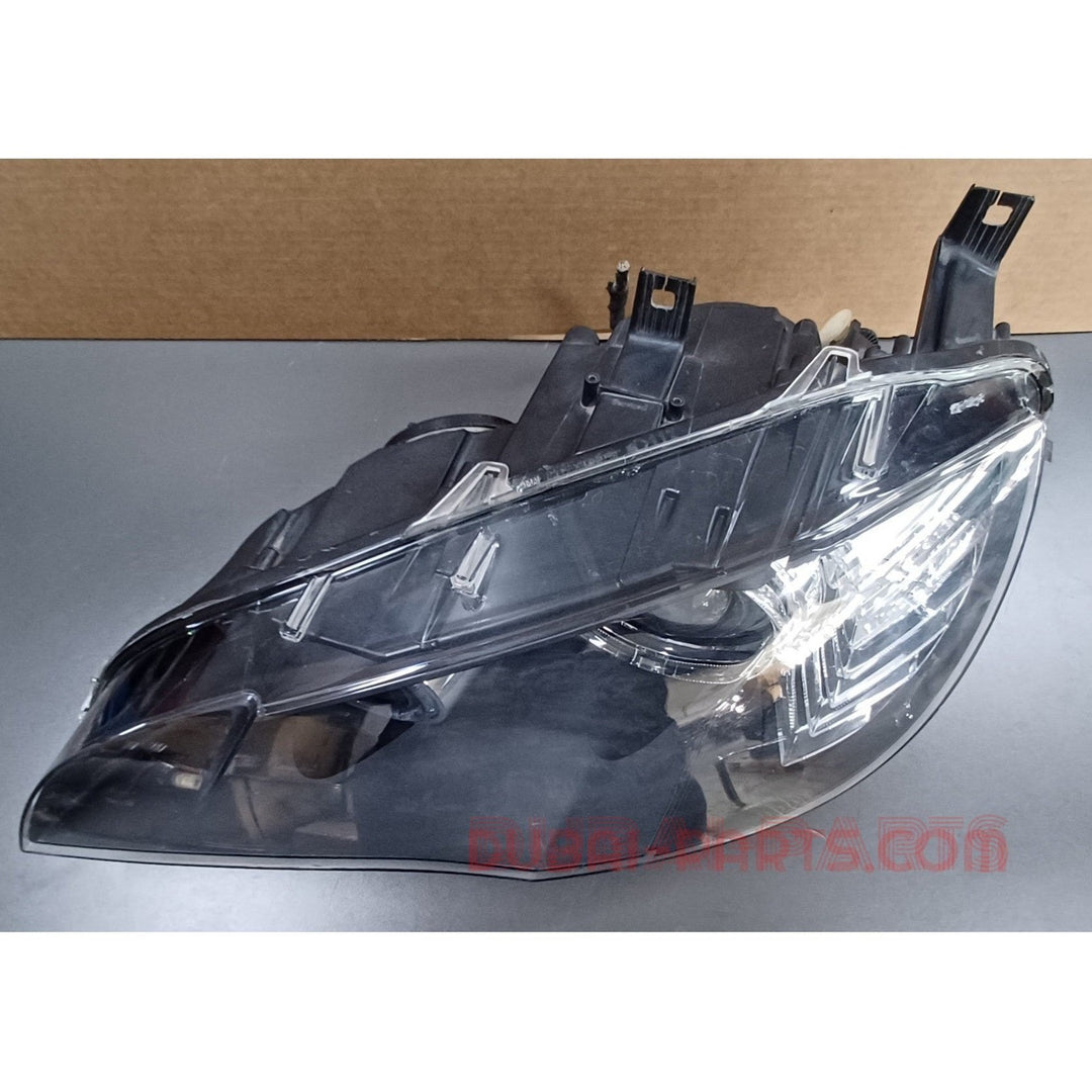 BMW X6,E71 Head Light Xenon Left Side ECE 7287011 Genuine Product used item