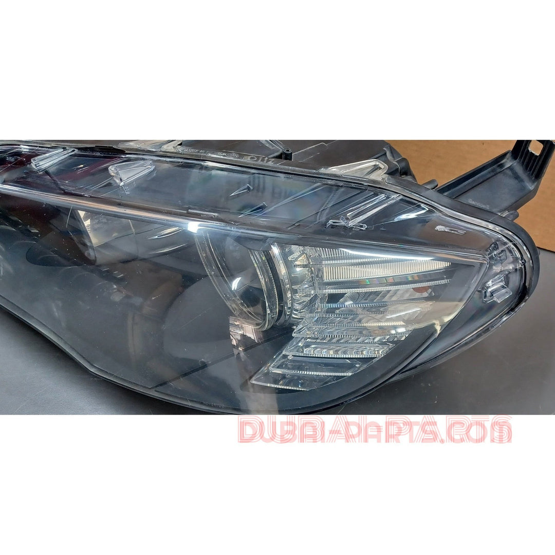 مصباح زينون أمامي يسار لسيارة BMW X6 E71، رقم القطعة ECE 7271359، منتج أصلي مستعمل