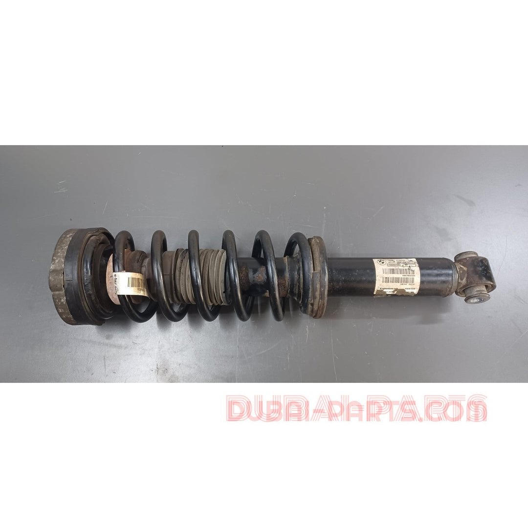 دعامة زنبركية خلفية مستعملة لسيارات BMW X3، F25، X4، F26، رقم القطعة 6796422. منتج أصلي مستعمل. 