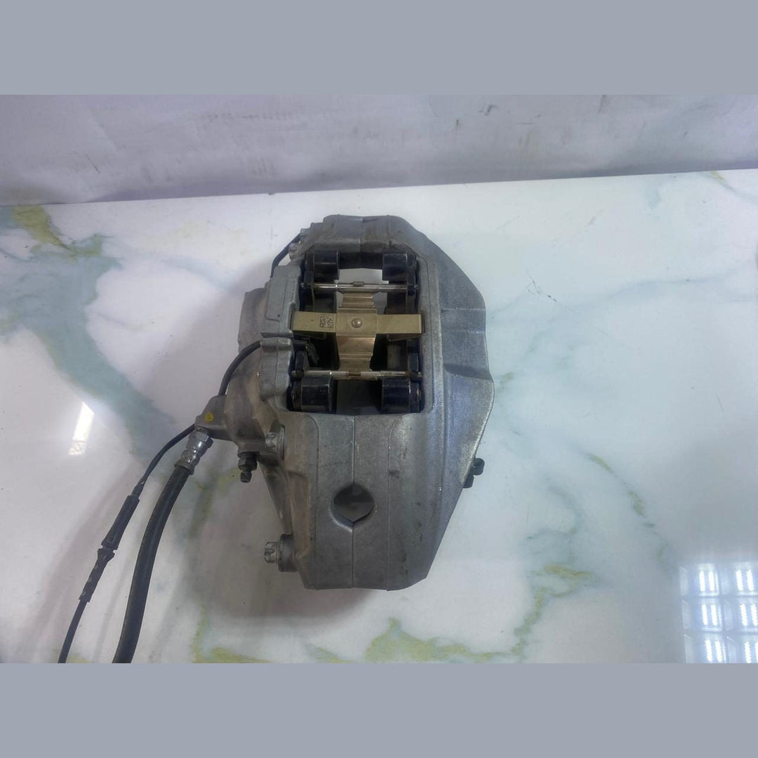 Front Brake Caliper Left, Part Number 8843331 BMW X5 G05 LCI 40I 2024