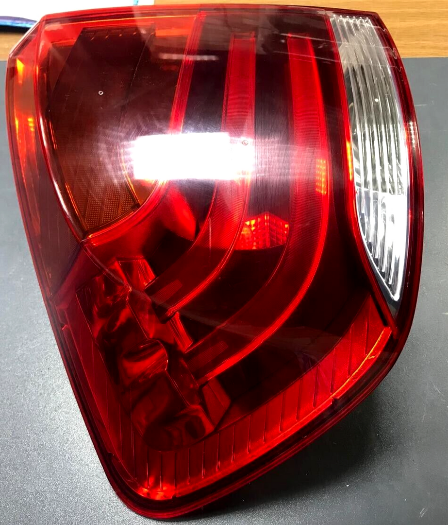 BMW X1 E84 LEFT SIDE REAR OUTER TAIL LIGHT  OEM 2990109